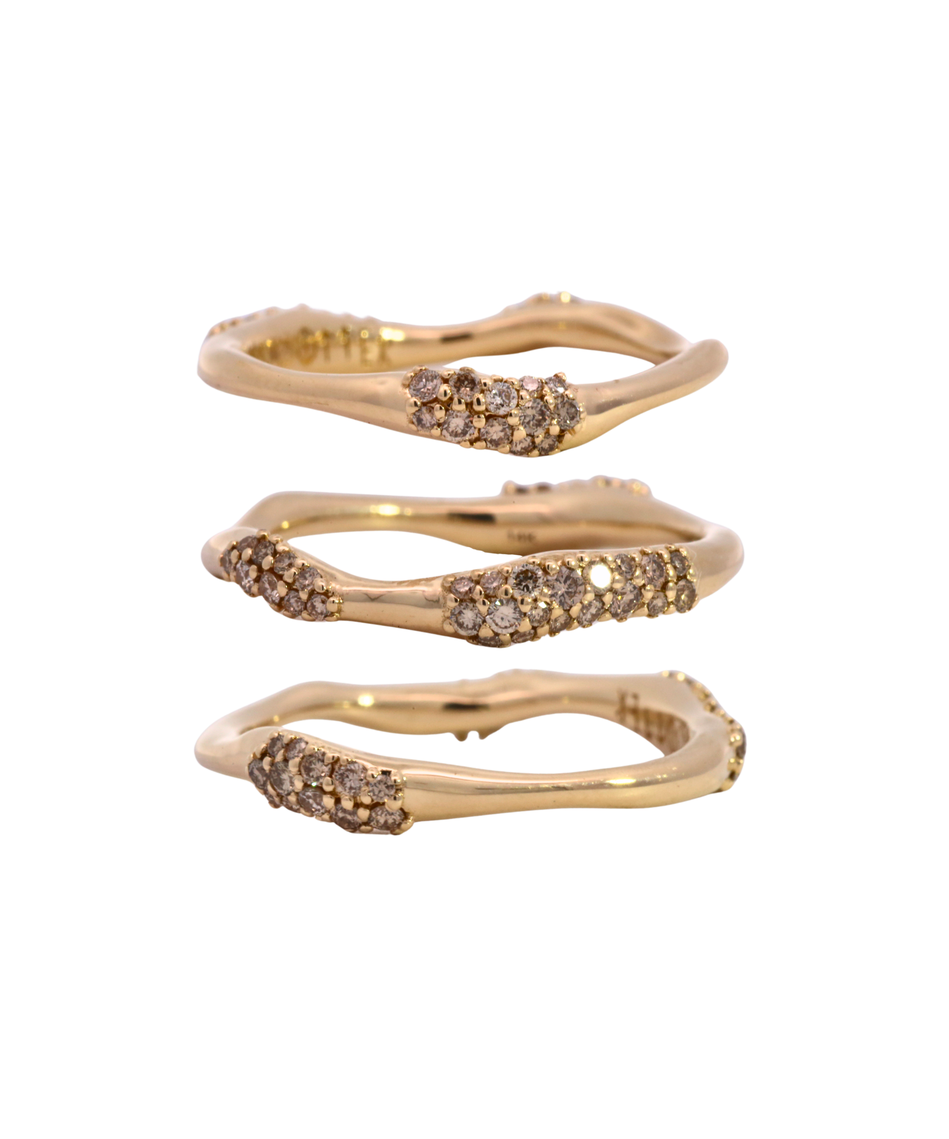EINAR Stacking Ring styled in a stack, 14K Fairmined gold with diamond pave