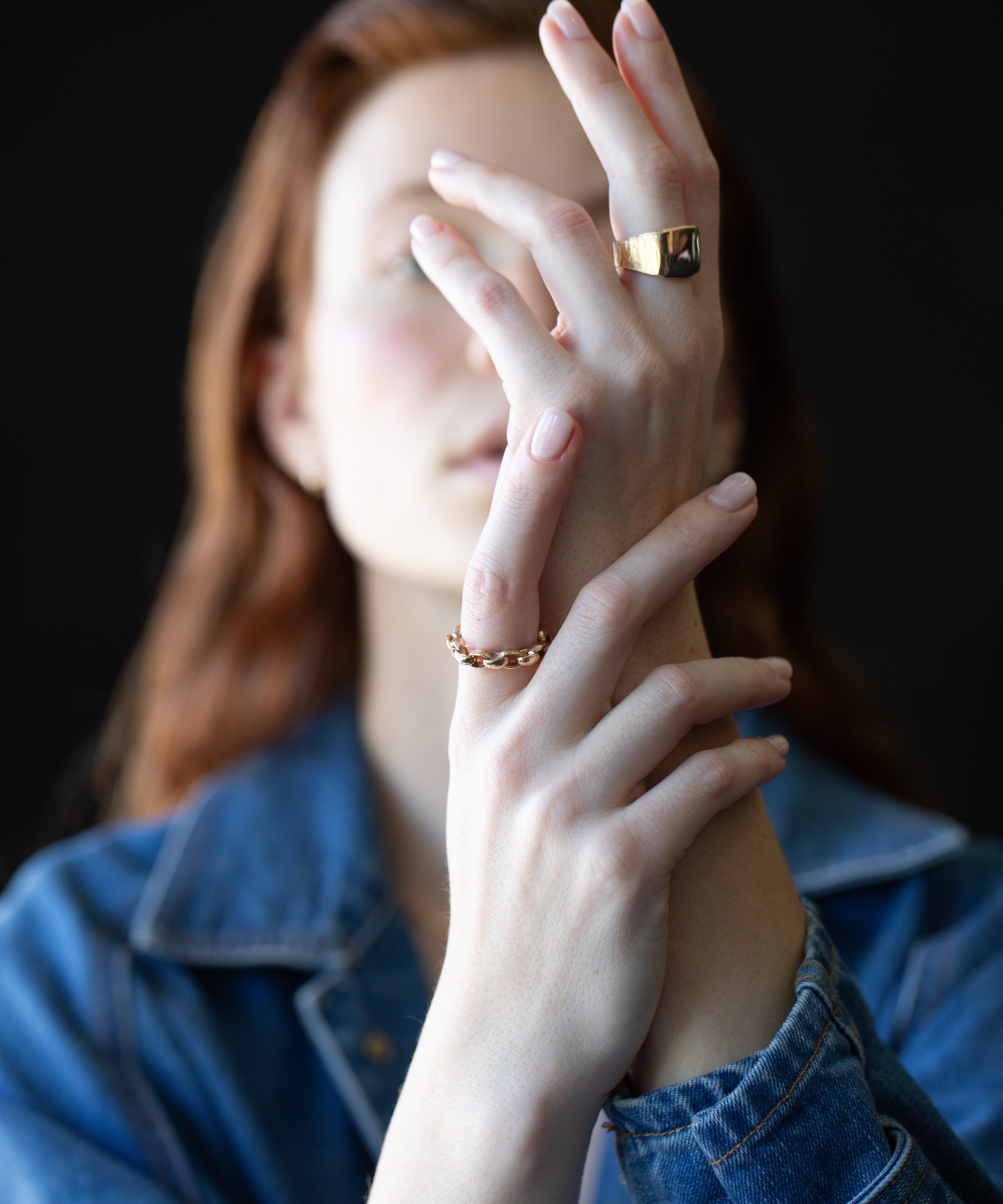 HANSI Signet Ring worn on hand, sculptural hand-carved detail