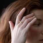 Offset diamond baguette engagement ring with fern wedding and cast in 14k gold