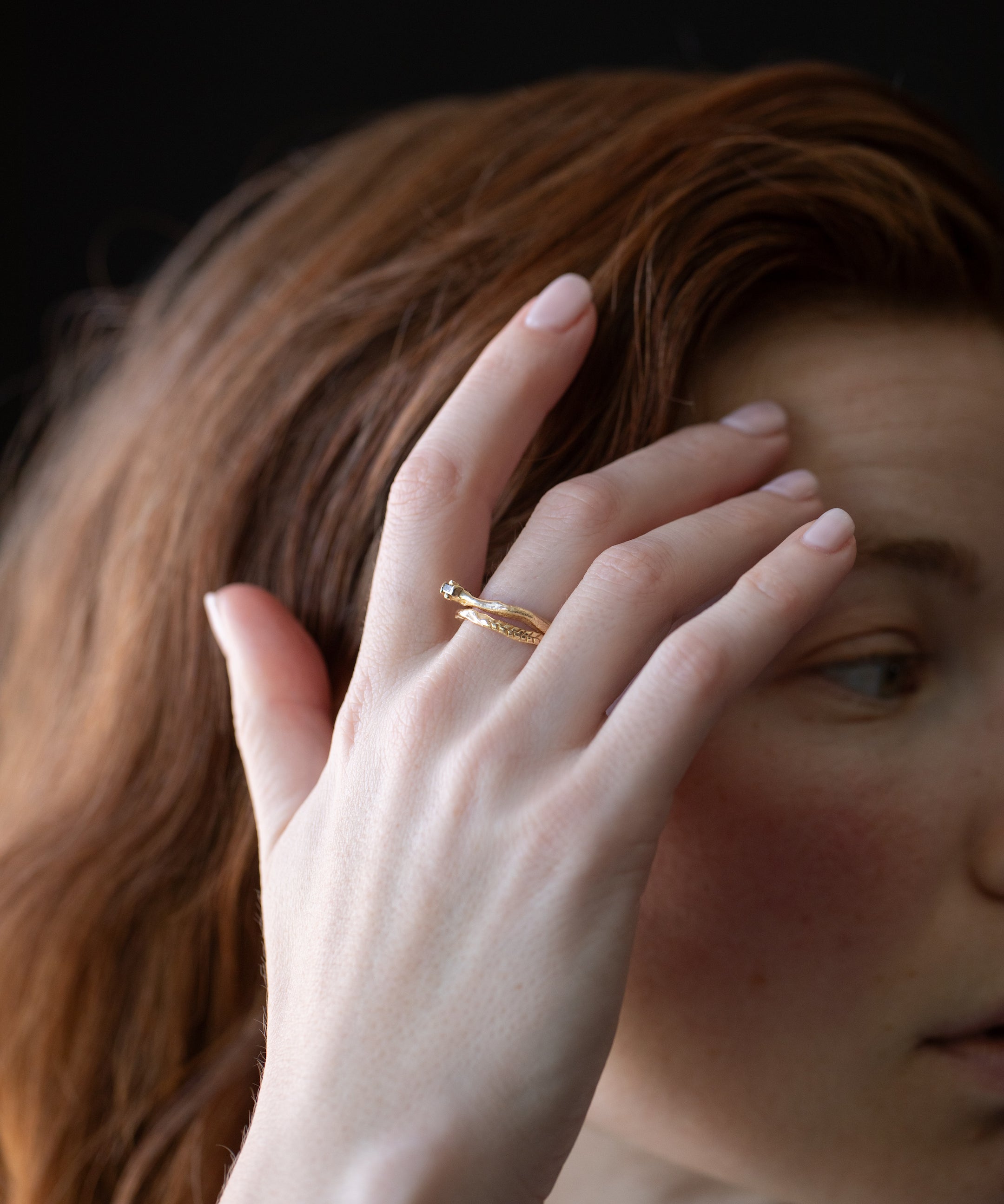 Offset diamond baguette engagement ring with fern wedding and cast in 14k gold