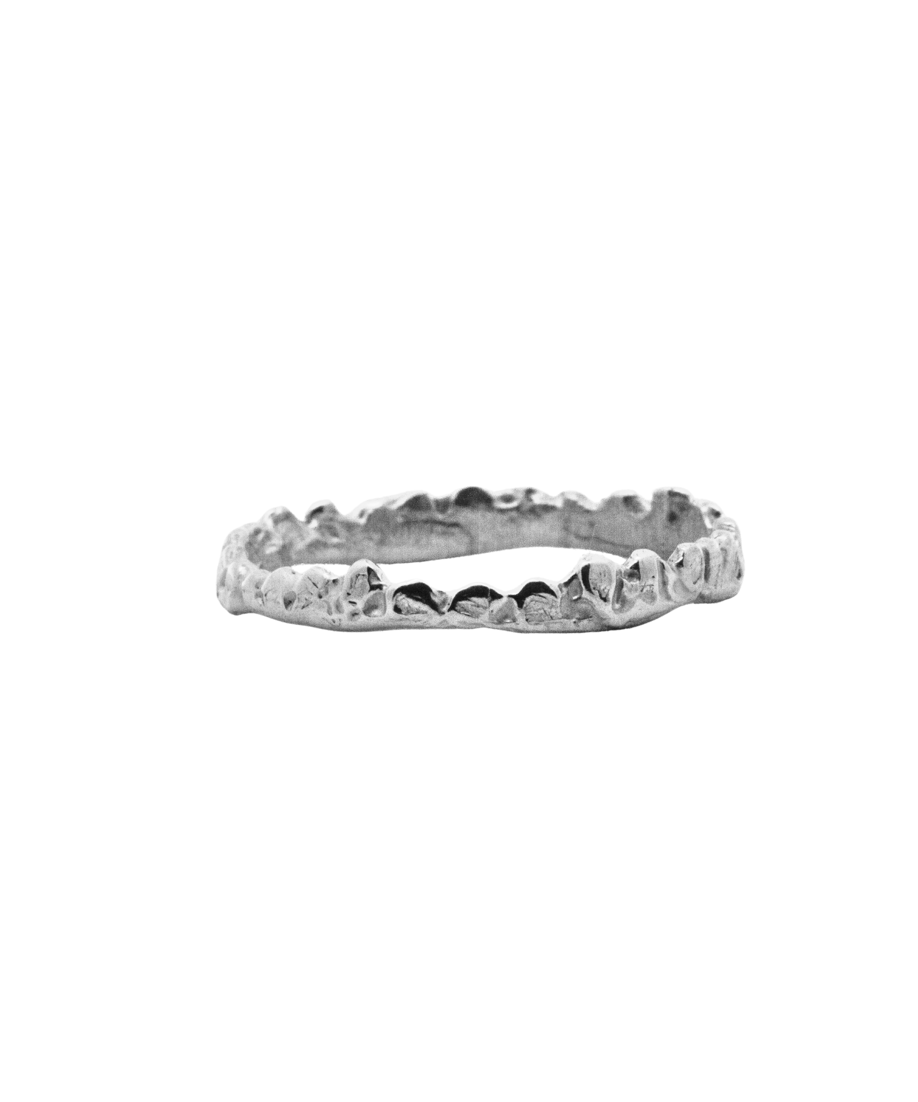 SIGGE Petite Crown Stacker Ring worn on hand, recycled sterling silver