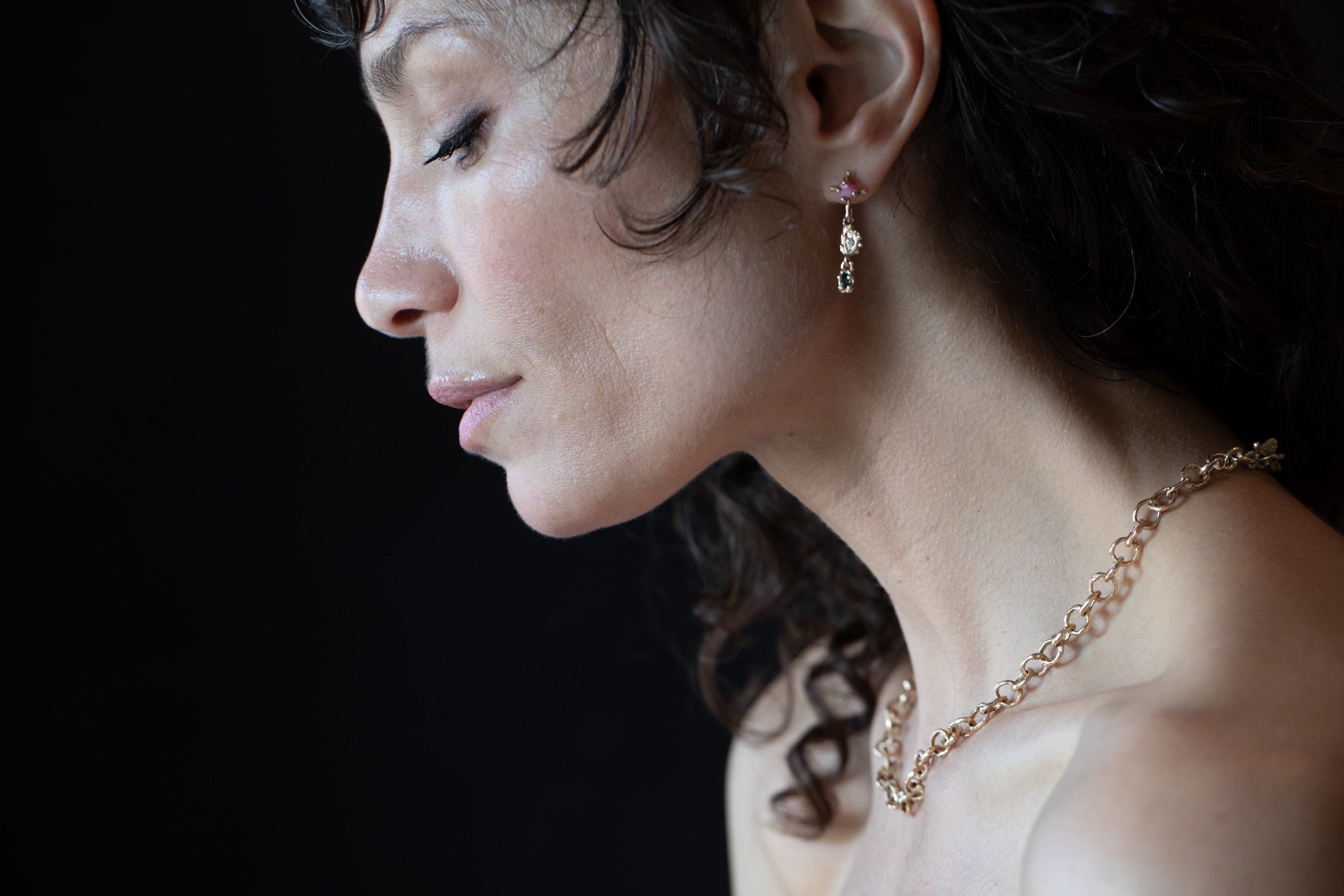 EYES Earrings texture close-up showing hand-carved detail, 14K Fairmined gold