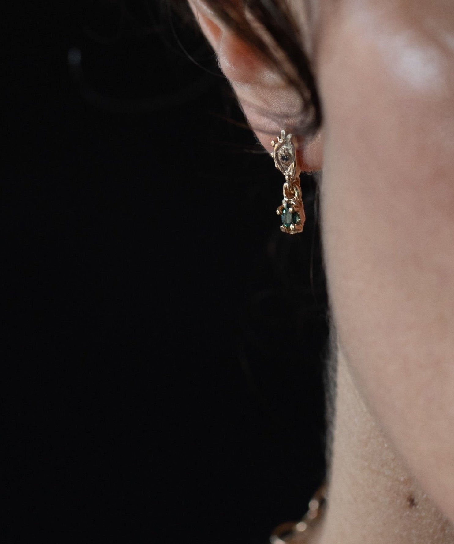 EYES Crying Earrings worn on ear, 14K Fairmined gold
