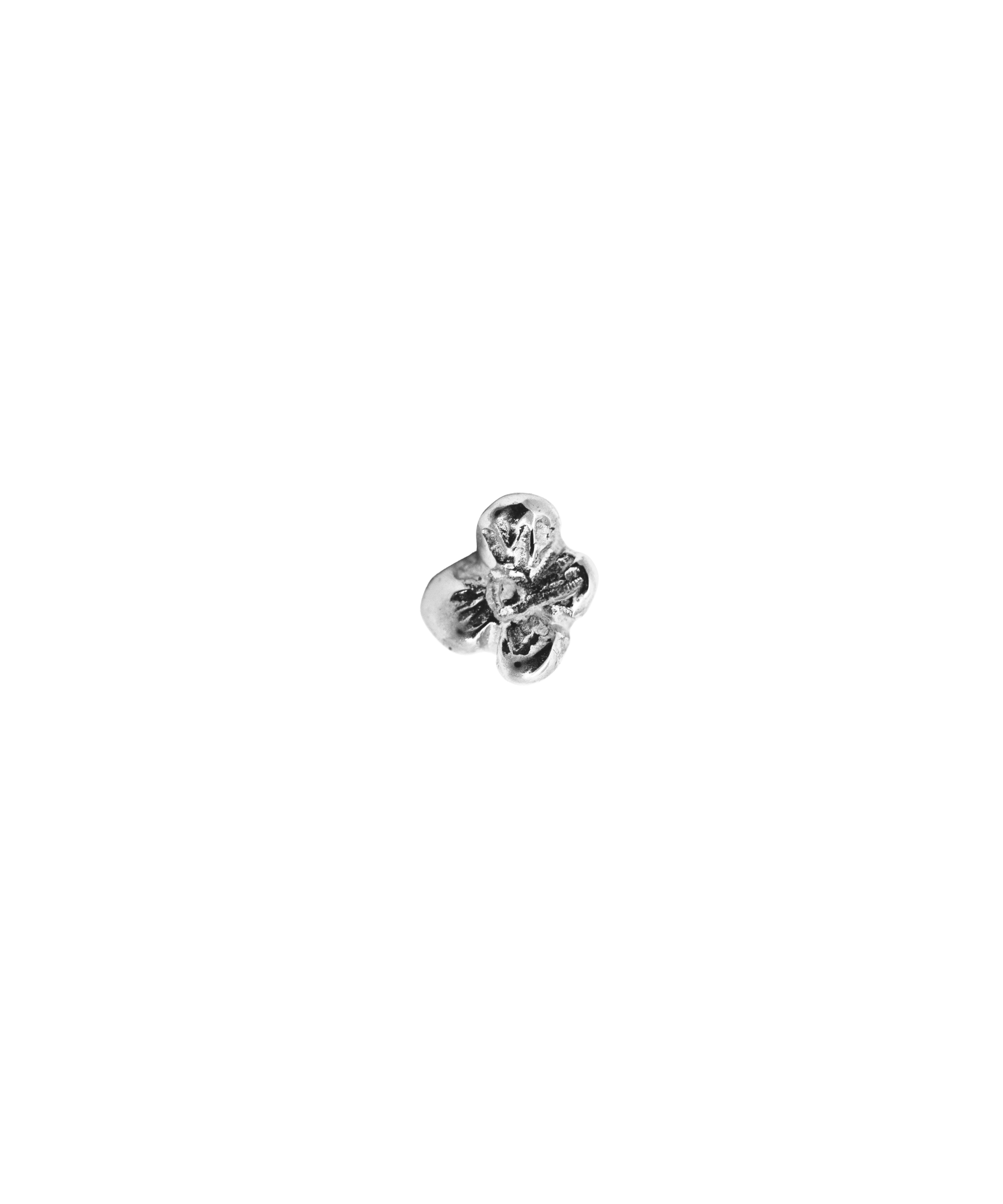 IDUN MINI Flower Stud Earrings worn on ear, recycled sterling silver