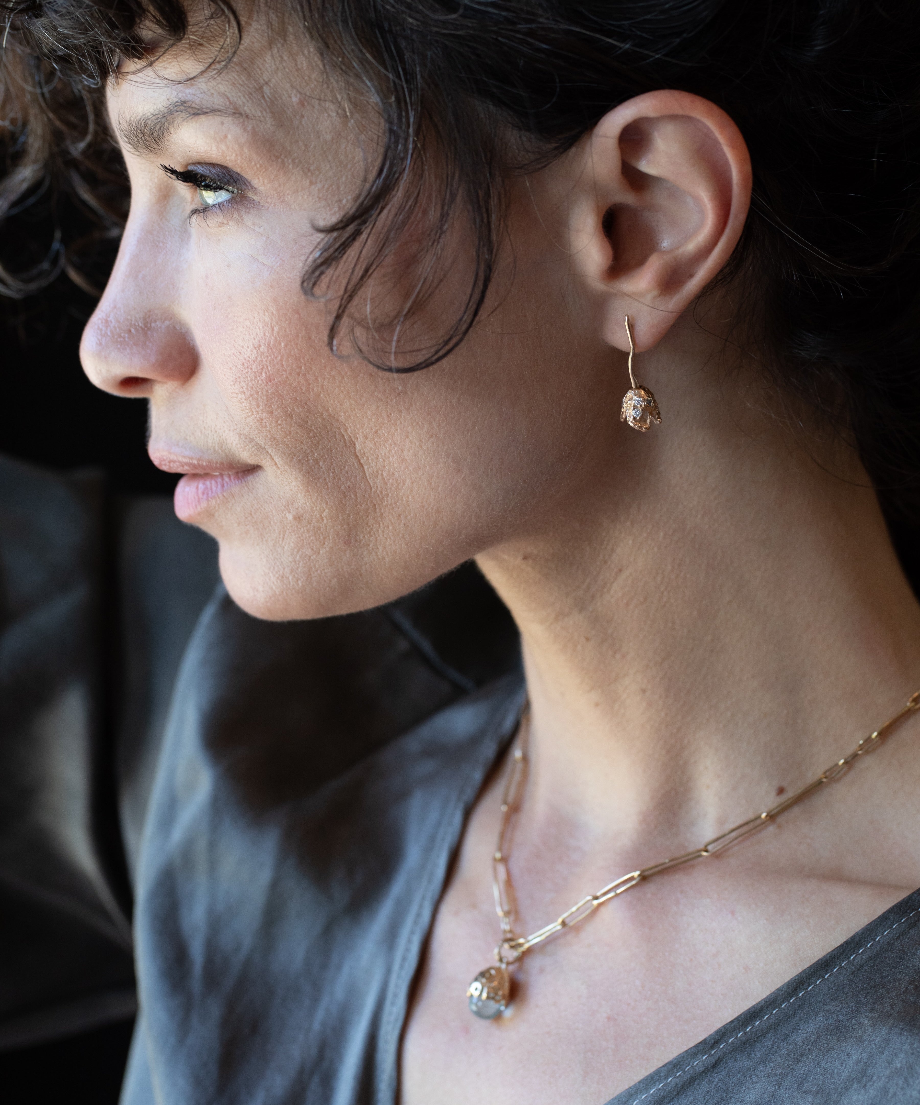 RORA Earrings scale view showing weight and form