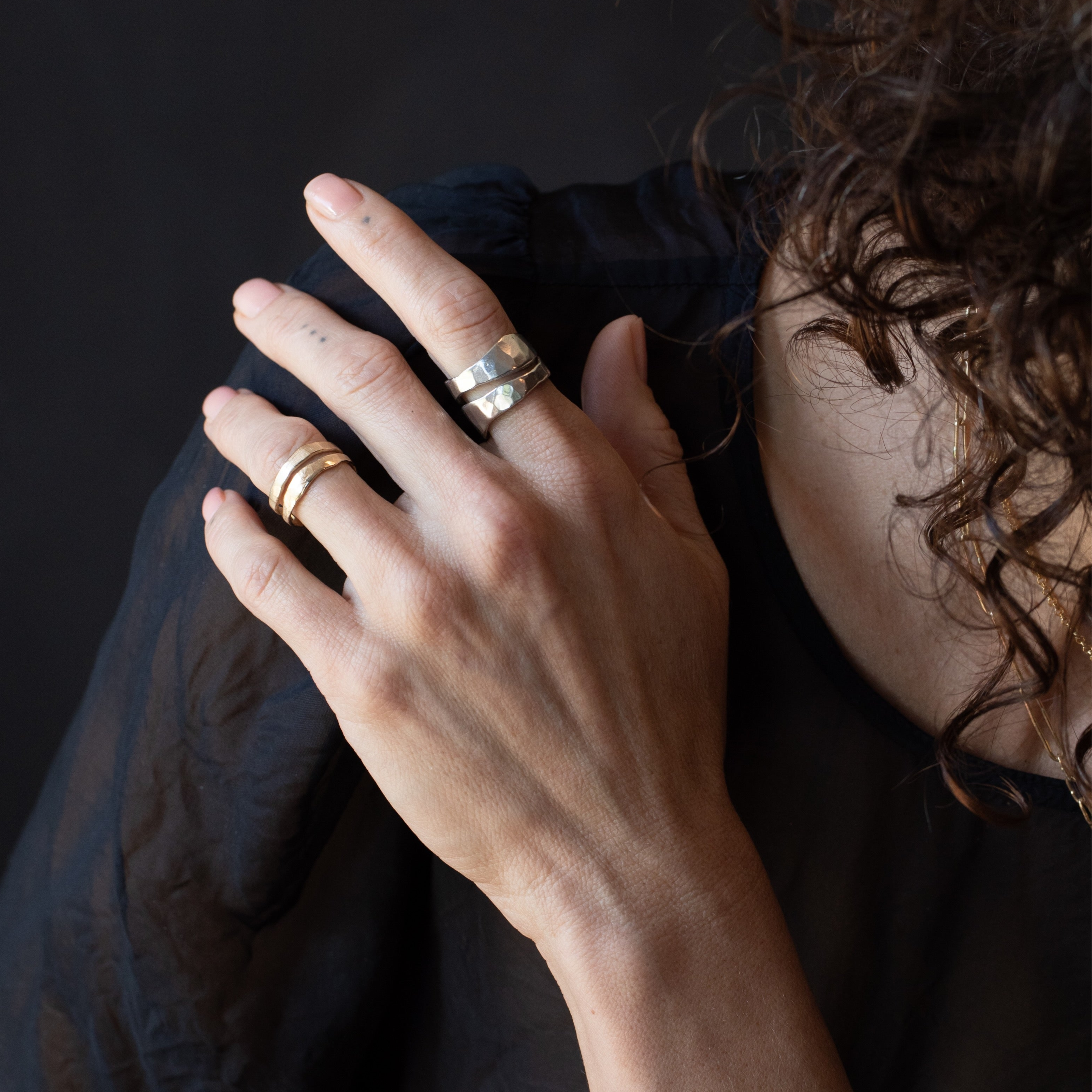 TWO RIVERS Wide Band Ring worn on hand, recycled sterling silver